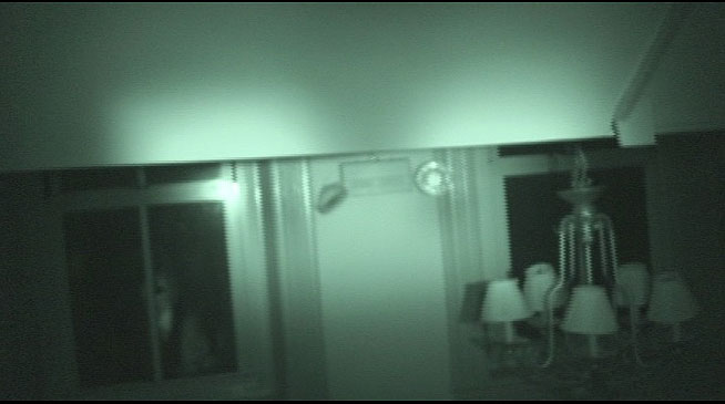 A ghost peeps in from the window during one of Shenandoah Shadows' investigations.