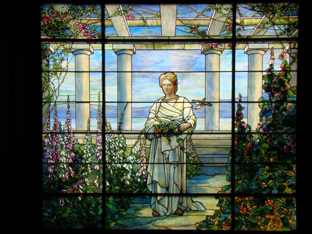 The palace's hand-painted Tiffany stained glass window bears the likeness of Mrs. Dooley.