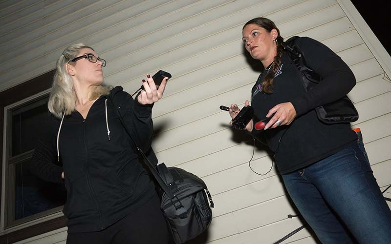 Tour guides using EMF Gear during a Ghost Tour