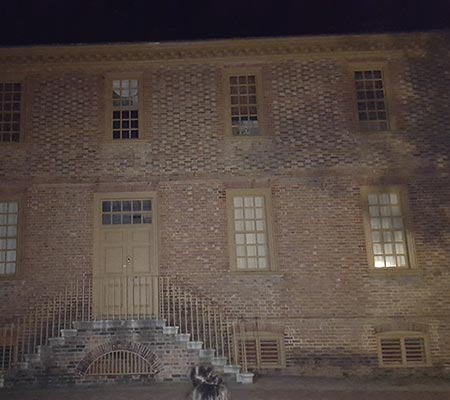 Old Building with mysterious lights in Haunted Colonial Williamsburg