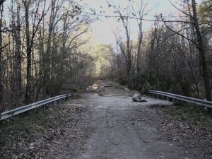 photo shows abandoned gravel road in helltown, seemingly leading to nowhere