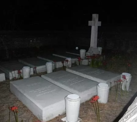 Strange orbs caught near some graves in a cemetery during a Colonial Ghost Tour