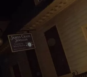 Strange orbs caught on camera near a Jewelers sign