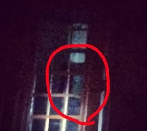 Shape in the window in a building on the Colonial Ghost Tour