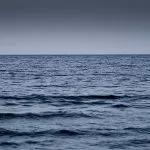 image shows an ocean horizon